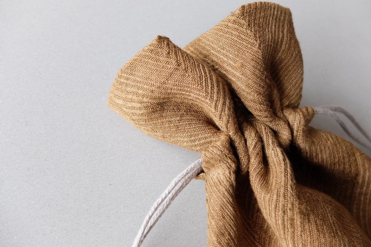 リネンヘリンボーン 巾着袋 M｜ライトブラウン